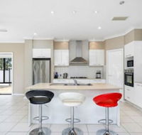 Central Gold Coast Large Modern Elevated Home - Accommodation Broome